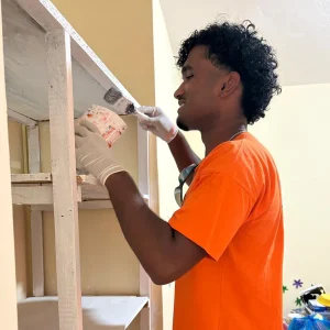 Volunteer with group of children