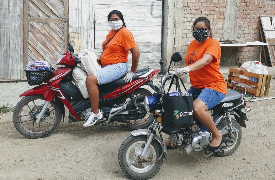 Project Manager, Hedu, and Physiotherapist, Claudia, delivering life boxes to our families