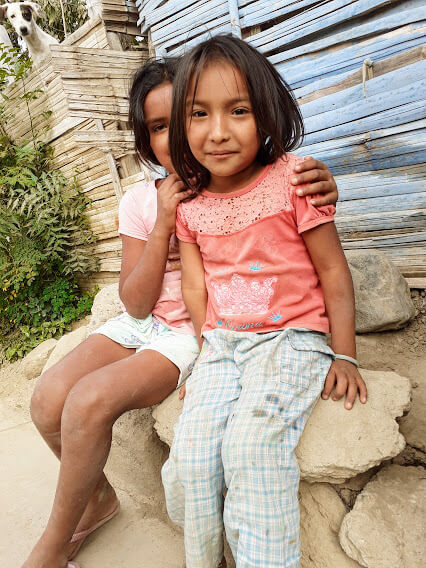 Two girls smiling for the camera