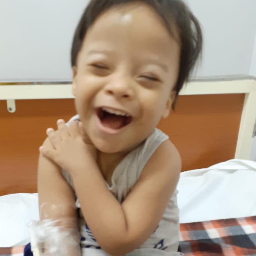 Laughing Kiya Survivor Child image