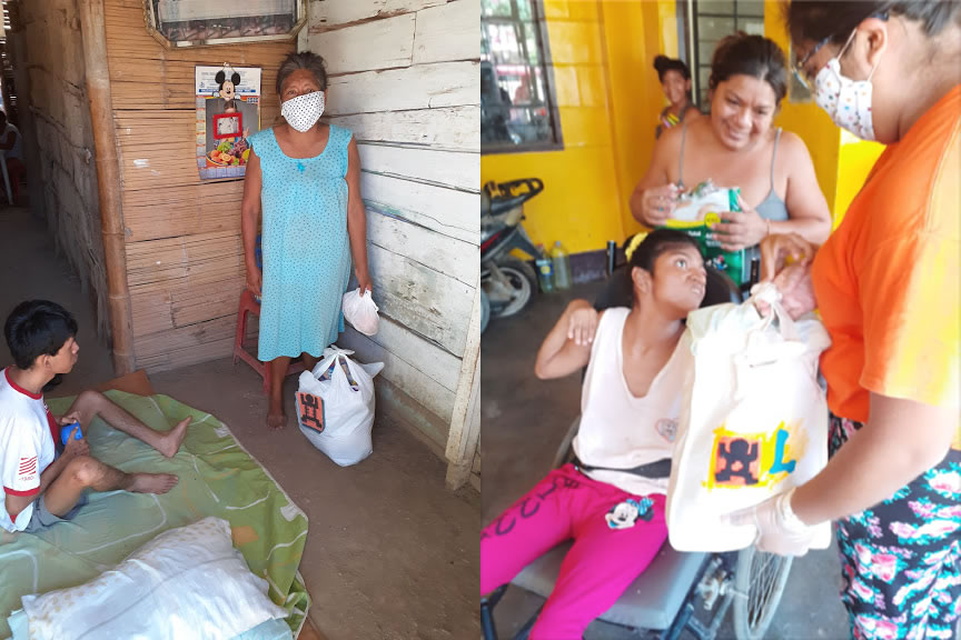 Children receiving their life boxes from Kiya volunteer