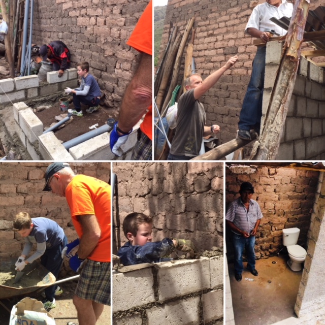 Volunteers building for charity project image